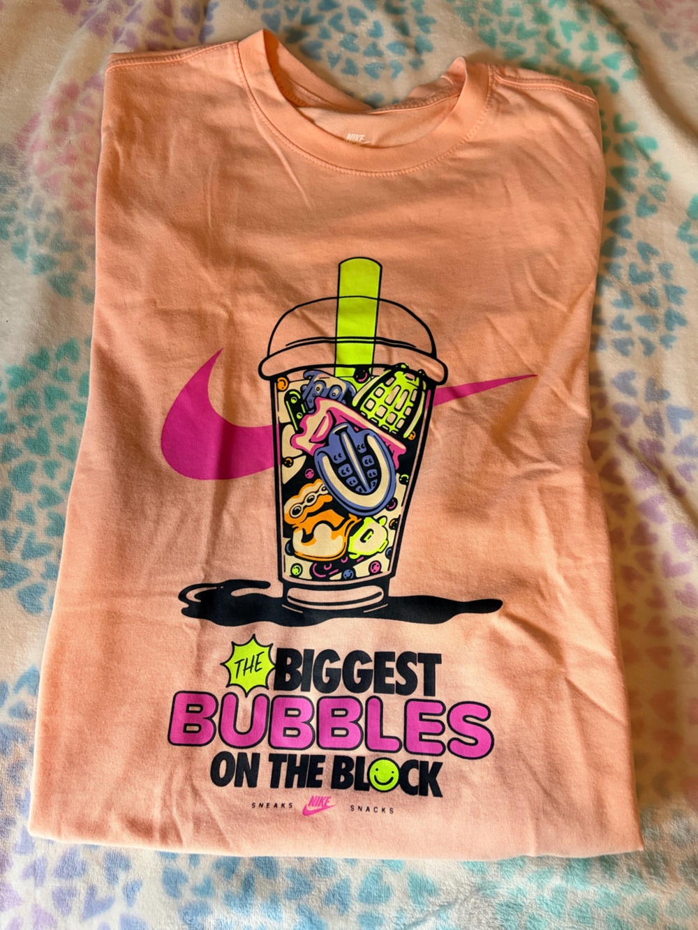 Nike Peach Short Sleeve Graphic Tee with Neon Pink & Lime Accents